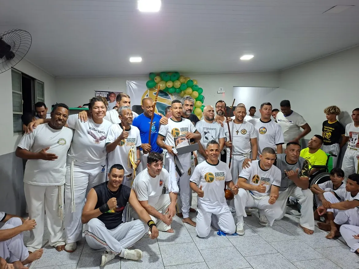 Integrantes do grupo reunidos no evento de graduação 2025